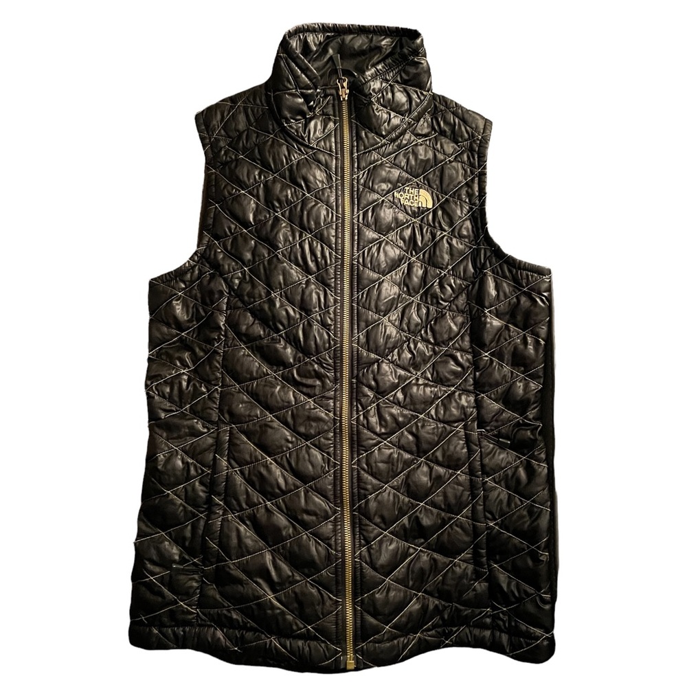 The North Face Quilted Black Vest with Gold Logo